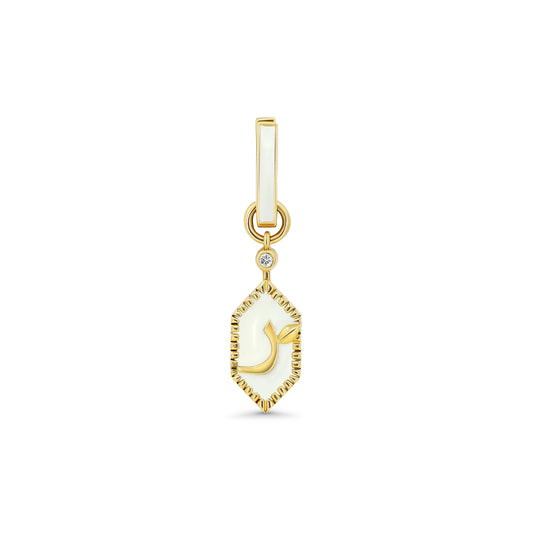 Gold pendant with a white stone on a white background