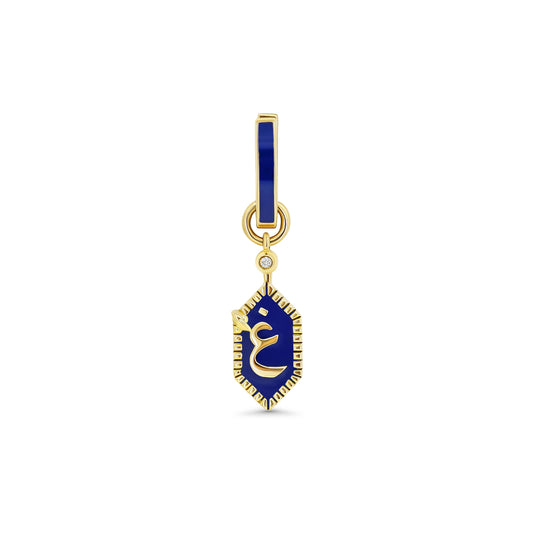 Gold and blue pendant on a white background