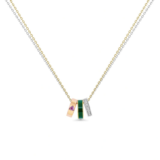 Necklace with a pendant featuring a pink gemstone and green stone on a white background